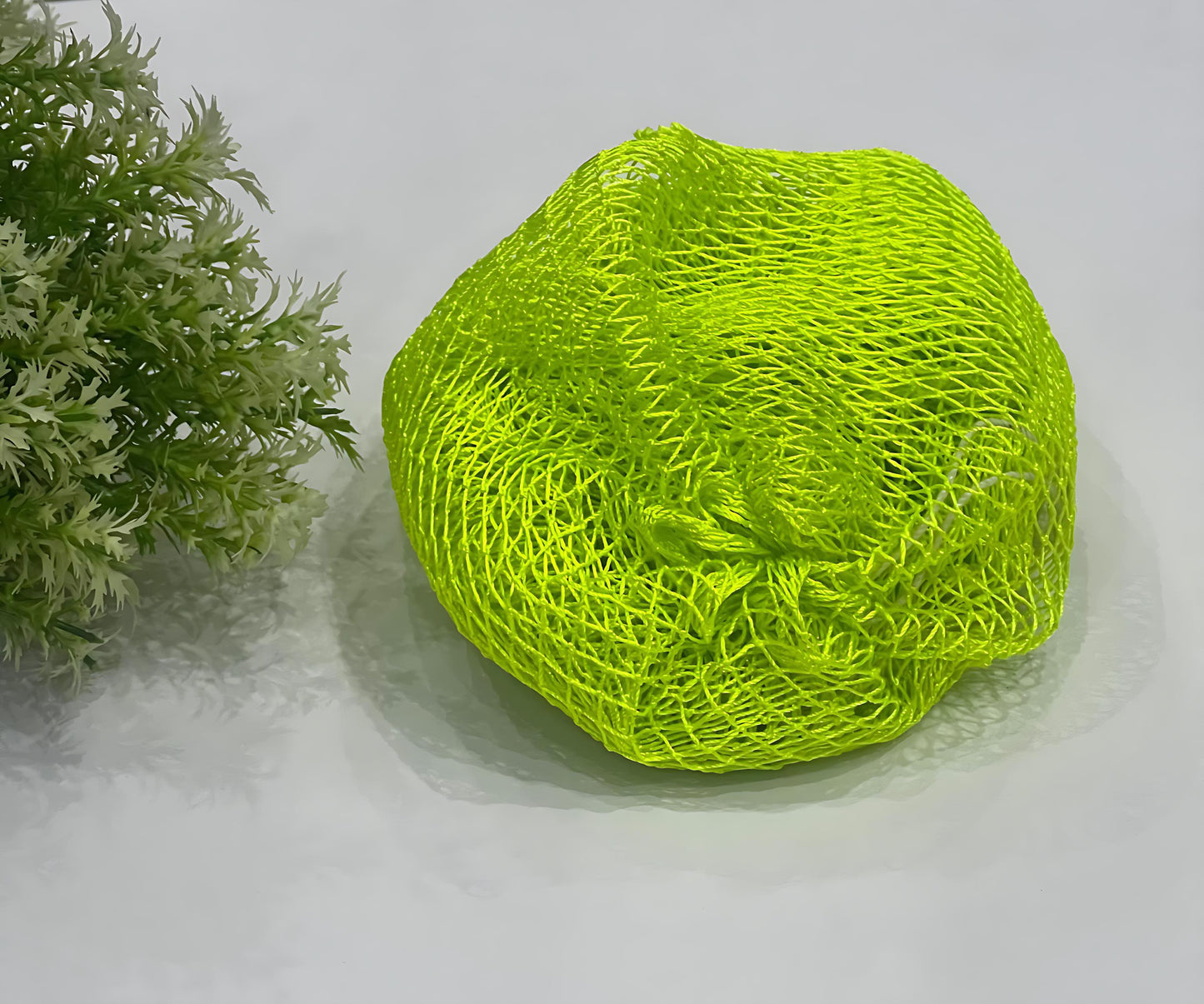 Handmade African exfoliating net in vibrant color – nylon sponge