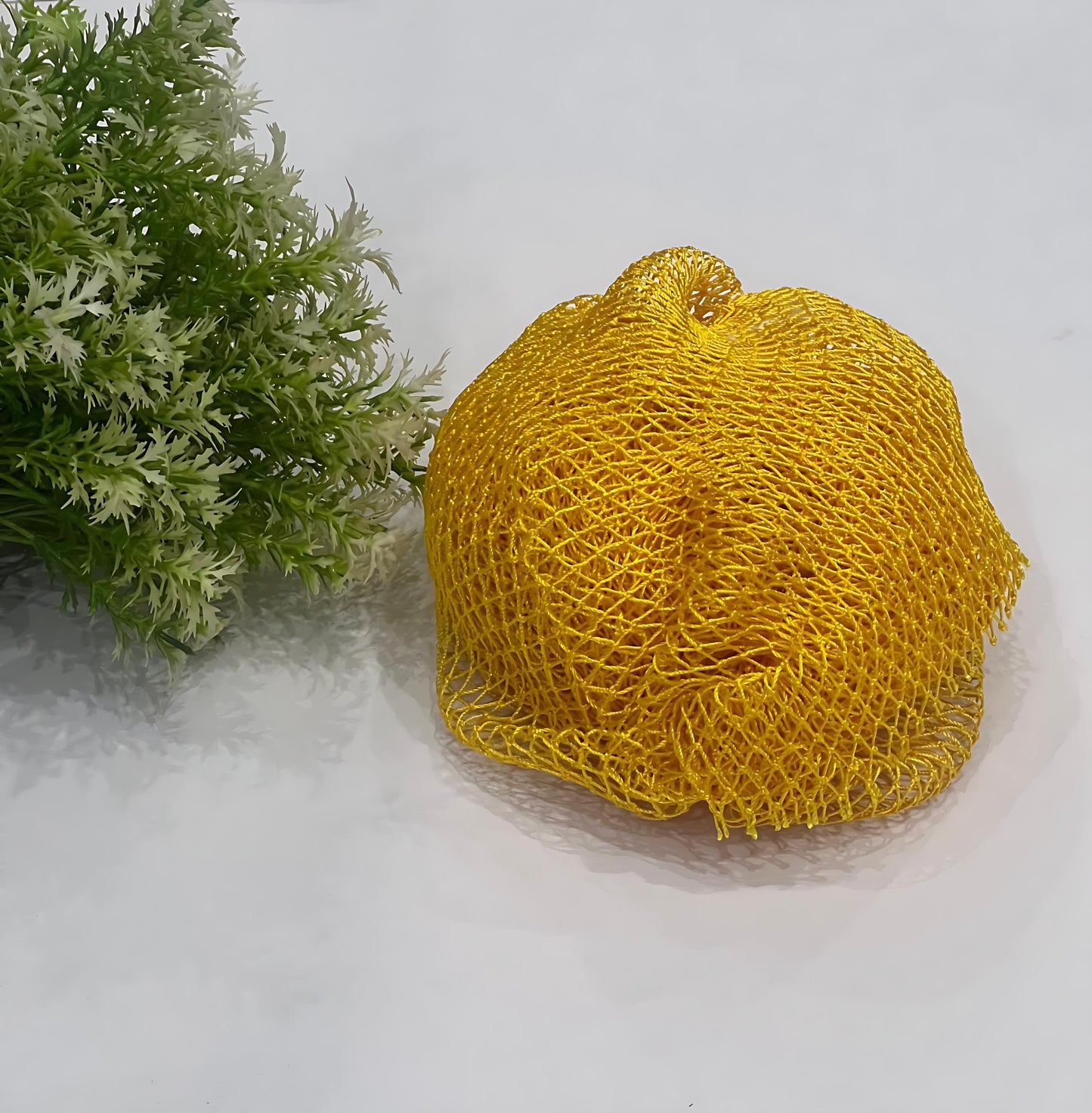 Handmade African exfoliating net in vibrant color – nylon sponge