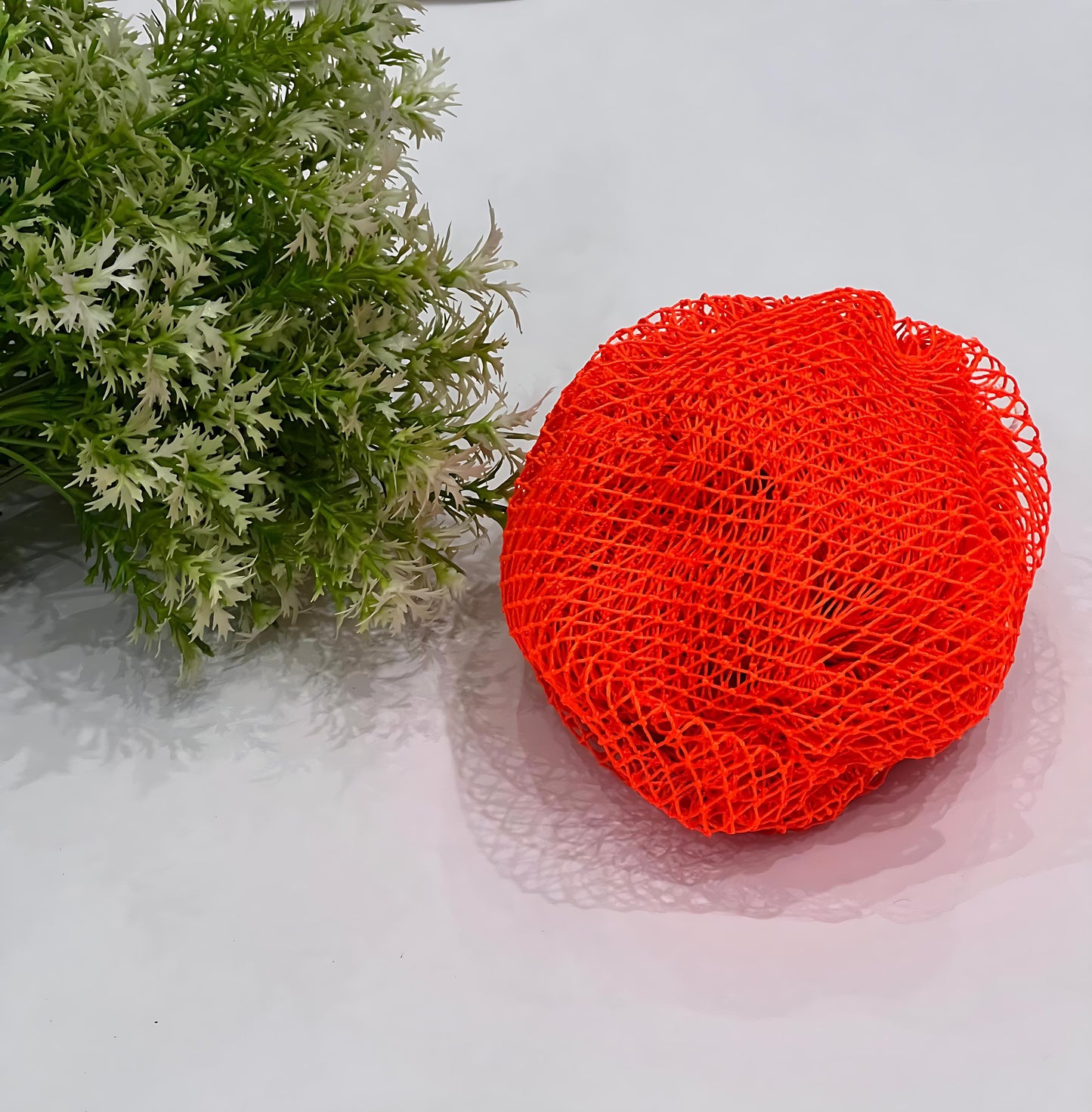 Handmade African exfoliating net in vibrant color – nylon sponge