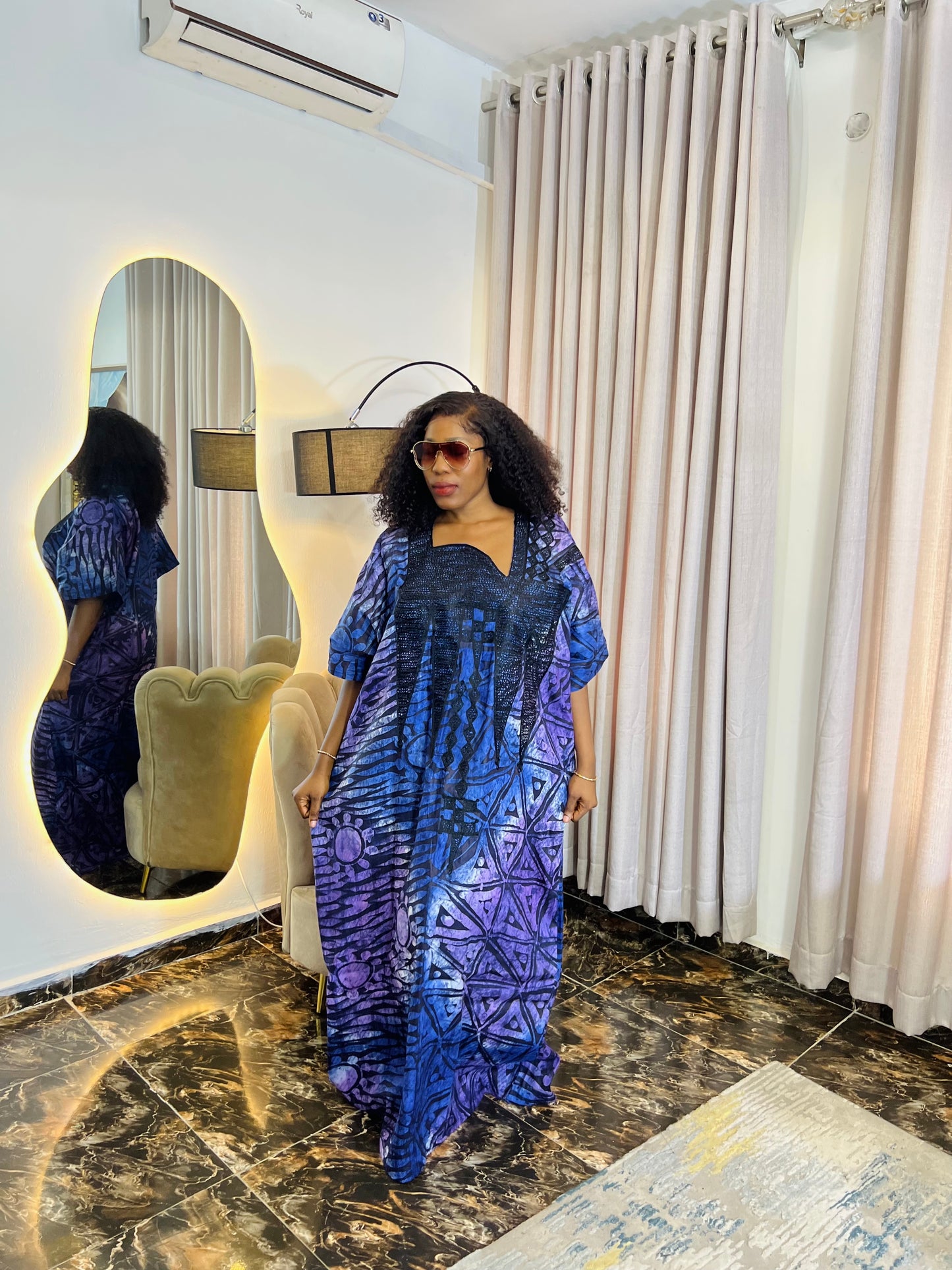 Embroidered Adire dress styled casually for everyday wear