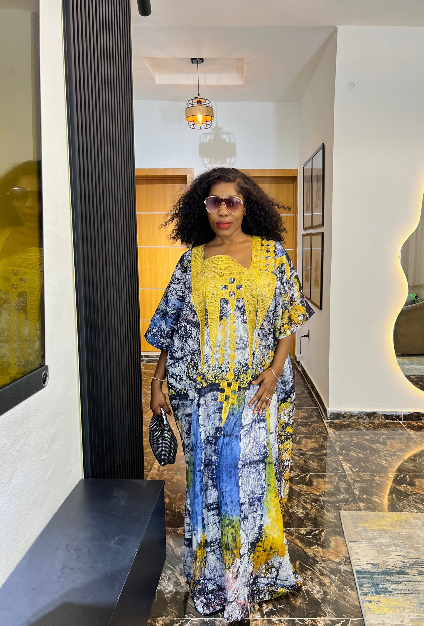 Embroidered Adire dress styled casually for everyday wear