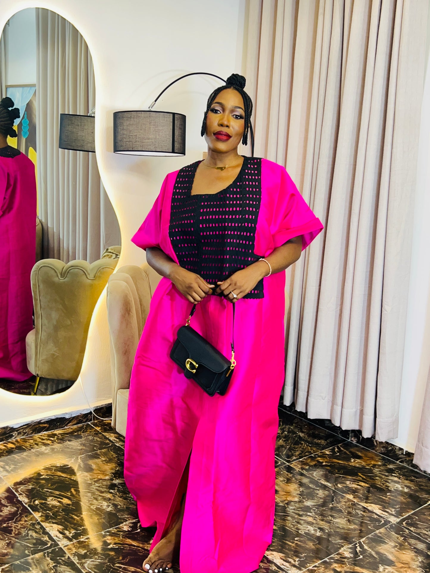African woman wearing a structured Mikado boubou dress – one-size kaftan