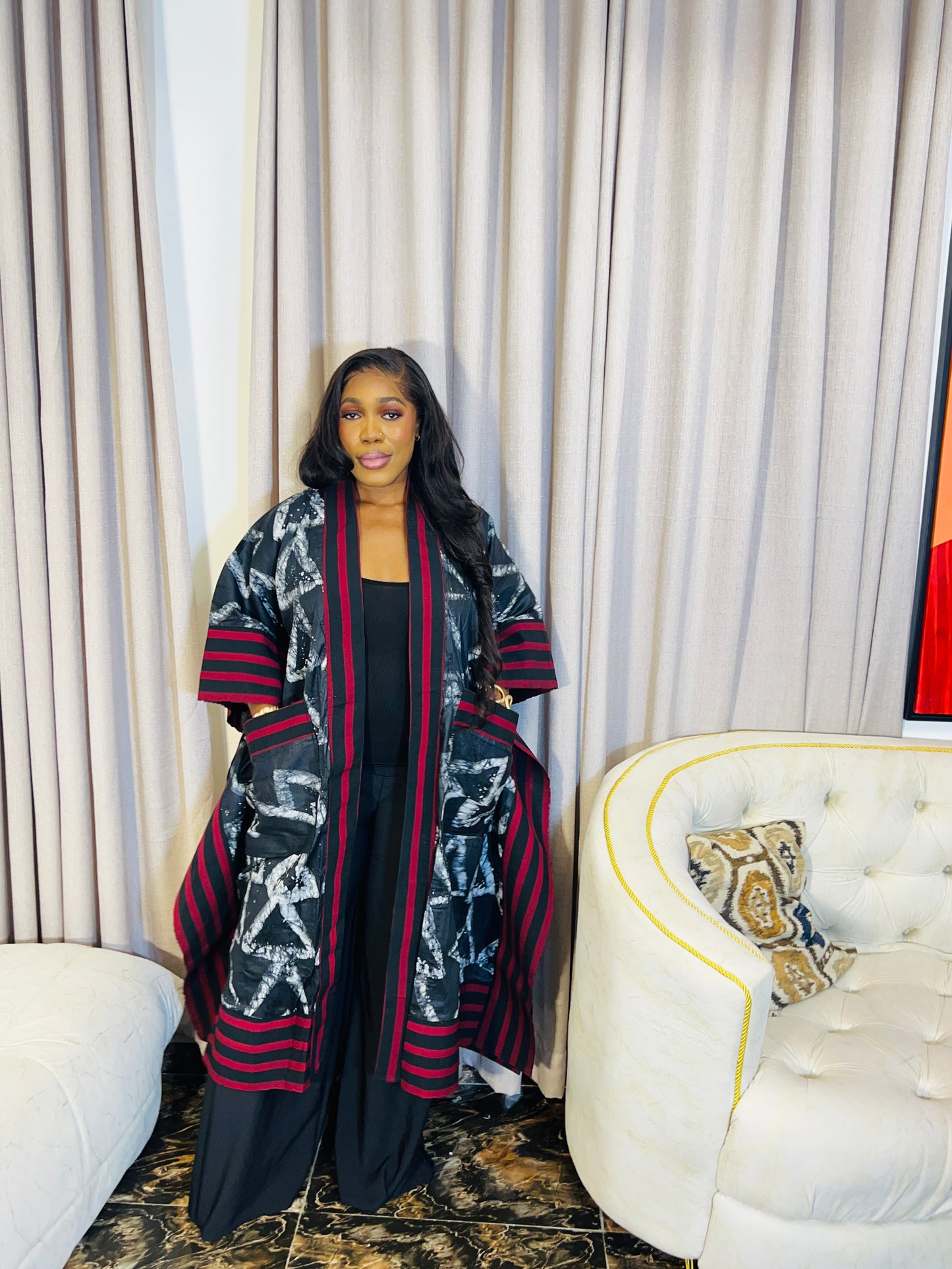 African woman wearing handmade Adire kimono jacket with Aso-Oke trim – one size fits most