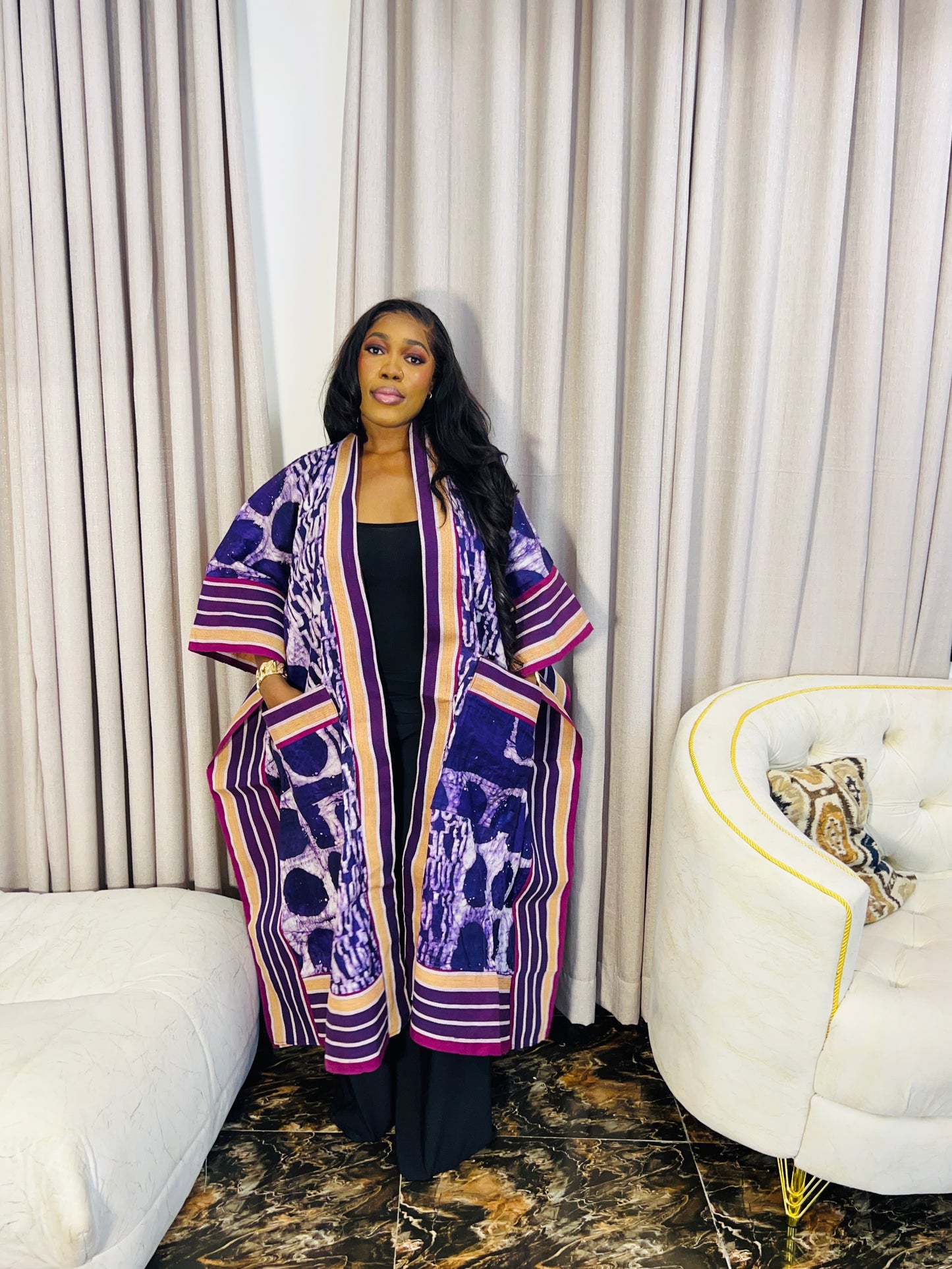African woman wearing handmade Adire kimono jacket with Aso-Oke trim – one size fits most