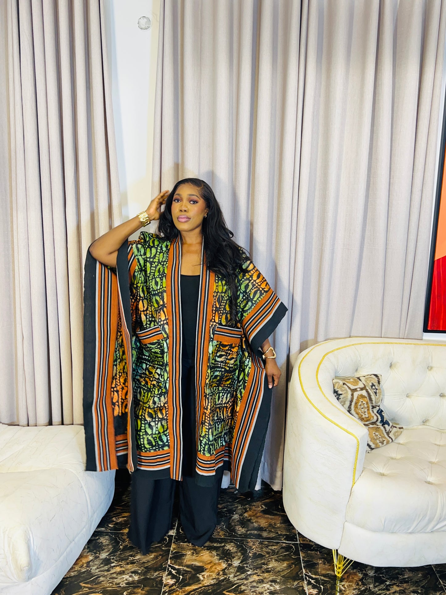 African woman wearing handmade Adire kimono jacket with Aso-Oke trim – one size fits most