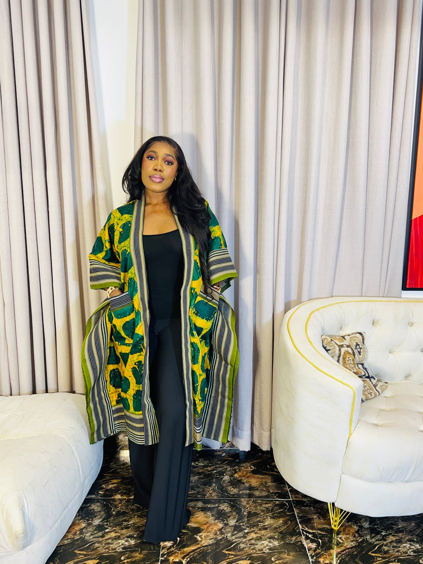 African woman wearing handmade Adire kimono jacket with Aso-Oke trim – one size fits most