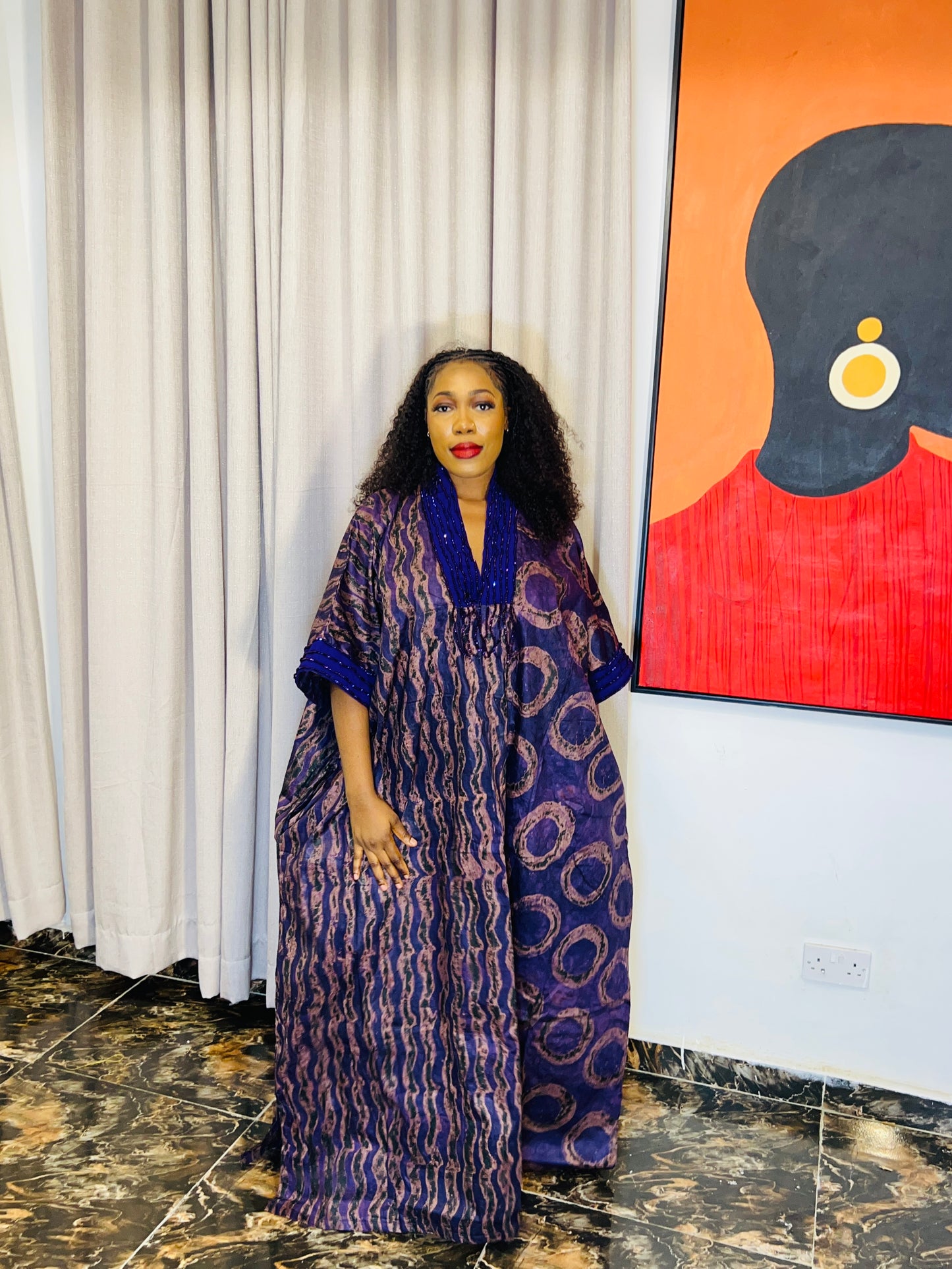 odel wearing Abike Adire beaded boubou dress