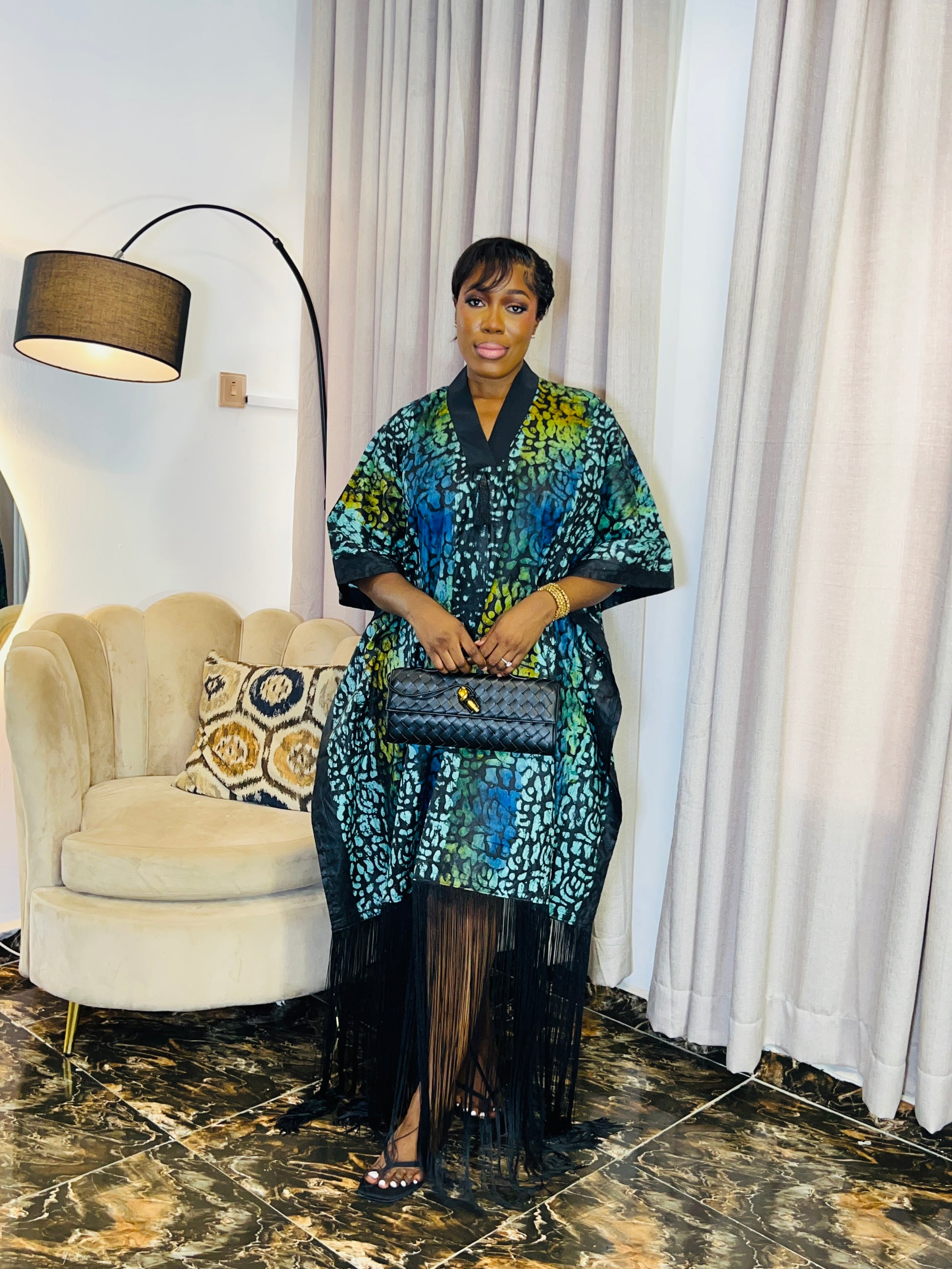 African woman wearing fringe bubu dress – hand-dyed tie-dye kaftan