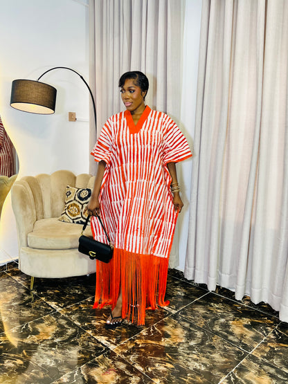 African woman wearing fringe bubu dress – hand-dyed tie-dye kaftan