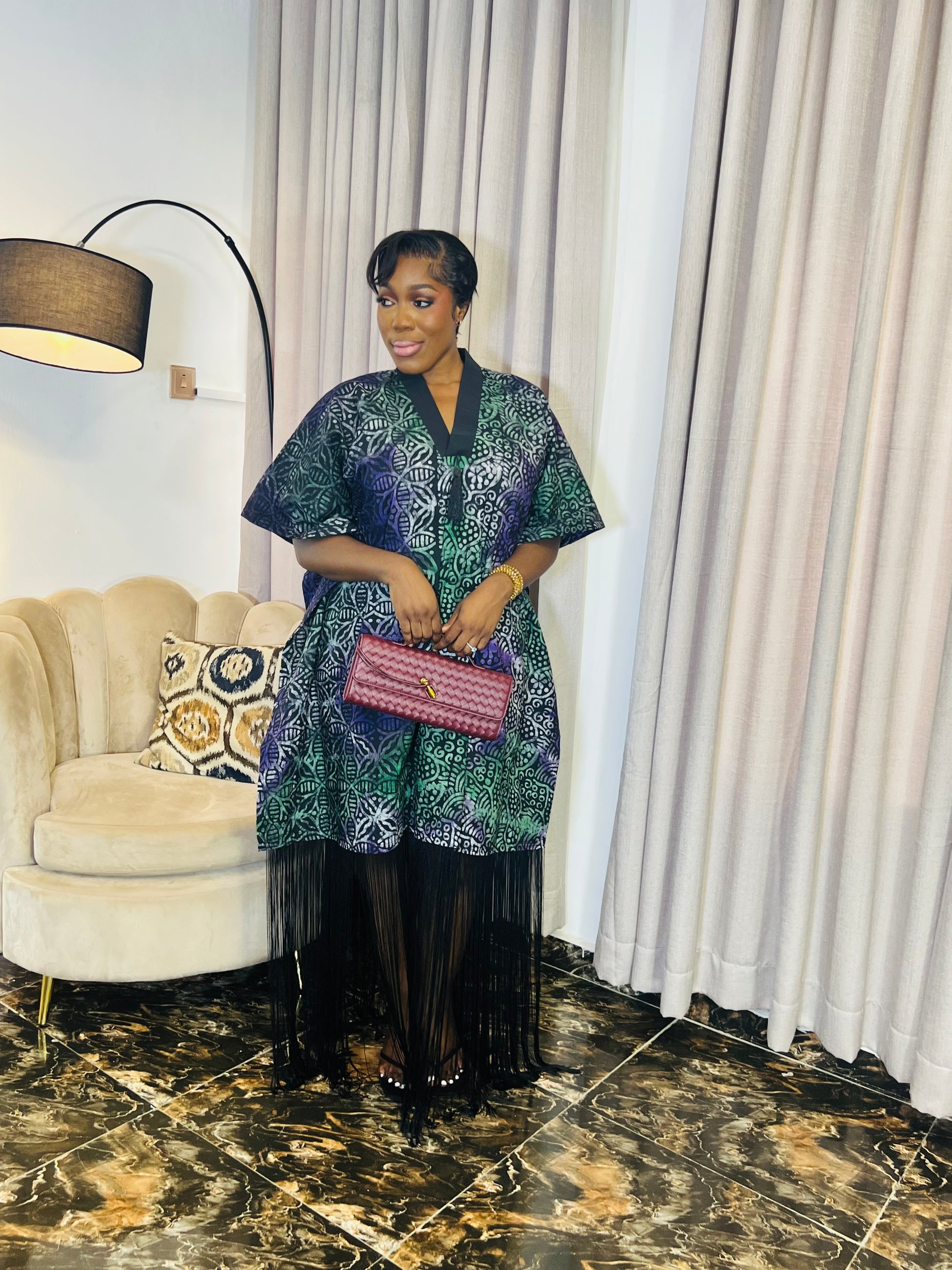 African woman wearing fringe bubu dress – hand-dyed tie-dye kaftan