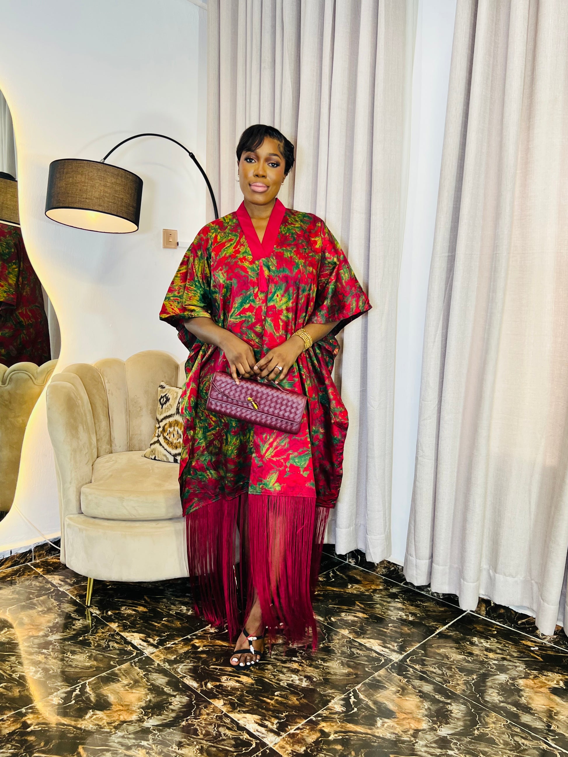 African woman wearing fringe bubu dress – hand-dyed tie-dye kaftan