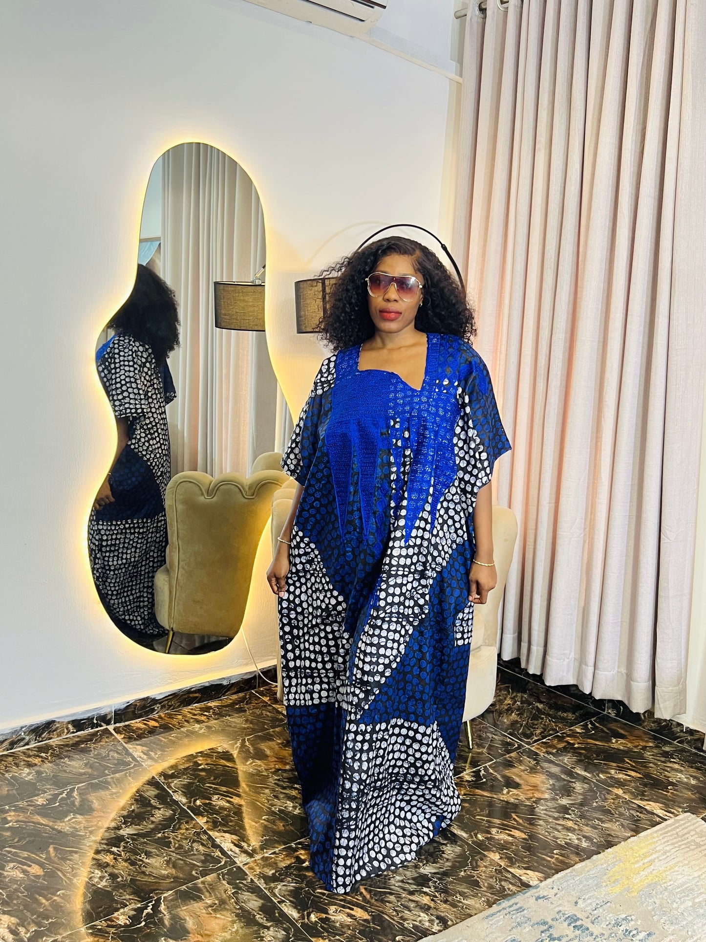 Embroidered Adire dress styled casually for everyday wear