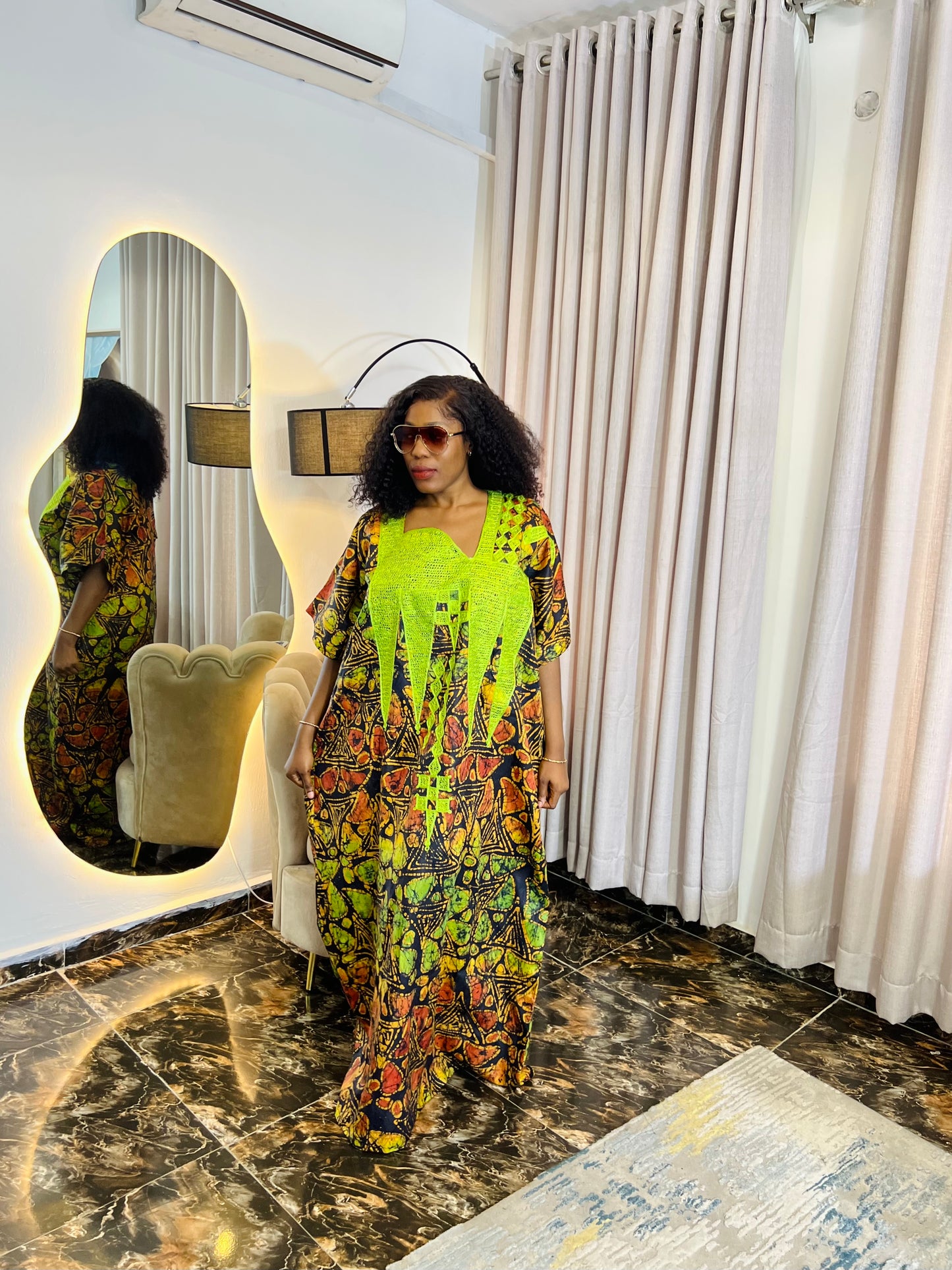 Embroidered Adire dress styled casually for everyday wear