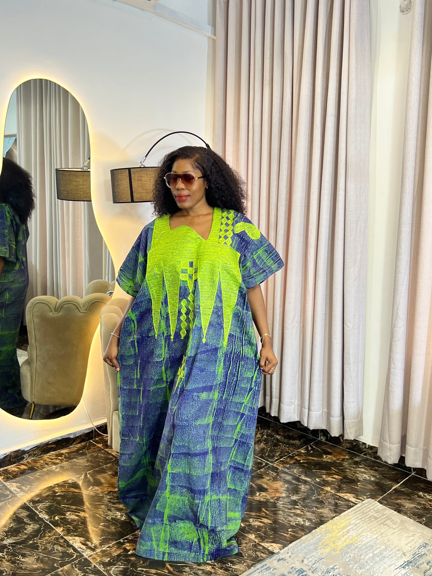 Embroidered Adire dress styled casually for everyday wear
