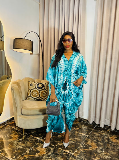 African woman in silk Adire boubou dress with elastic waistband