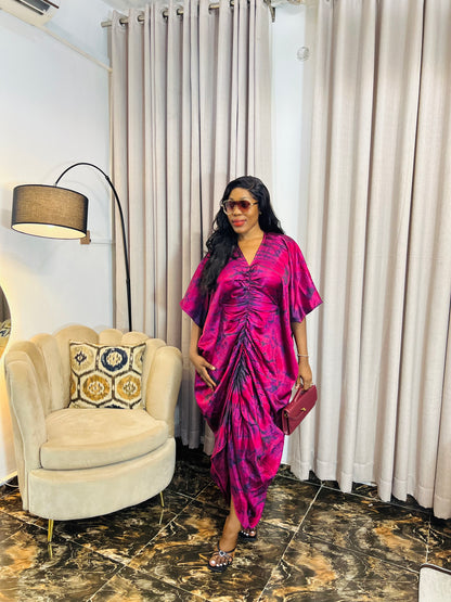 African woman in silk Adire boubou dress with elastic waistband
