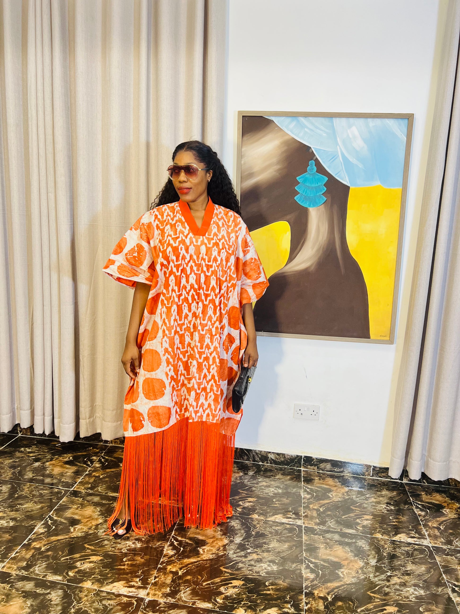 African woman wearing fringe bubu dress – hand-dyed tie-dye kaftan