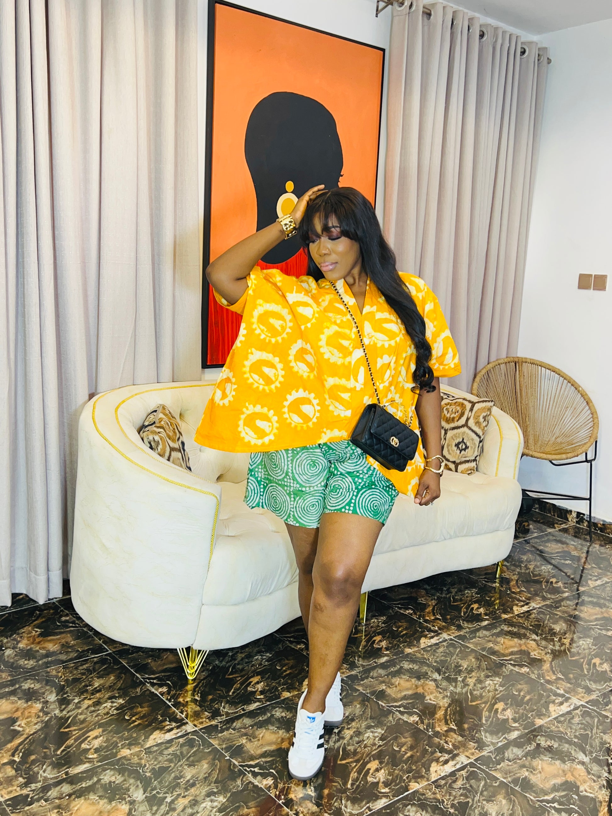 oversized Adire two-piece set with loose top and matching shorts, fits M–XL, tall girl friendly.