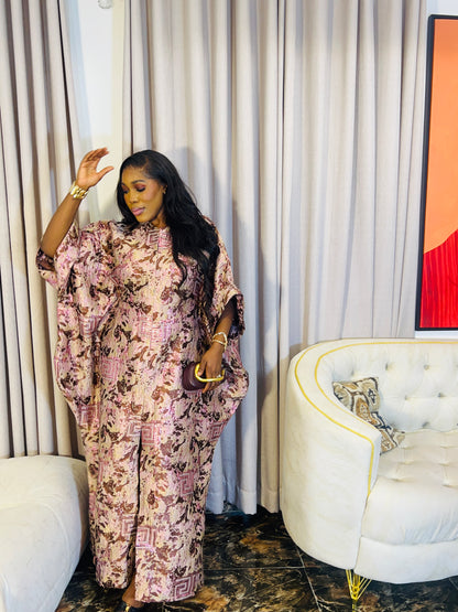Woman wearing Ayinke Brocade Boubou – 62” length, oversized fit.