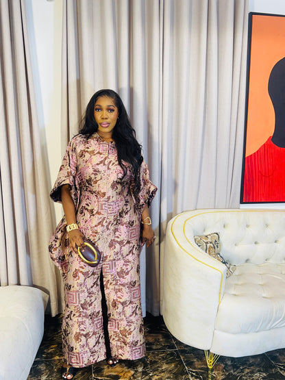 Woman wearing Ayinke Brocade Boubou – 62” length, oversized fit.