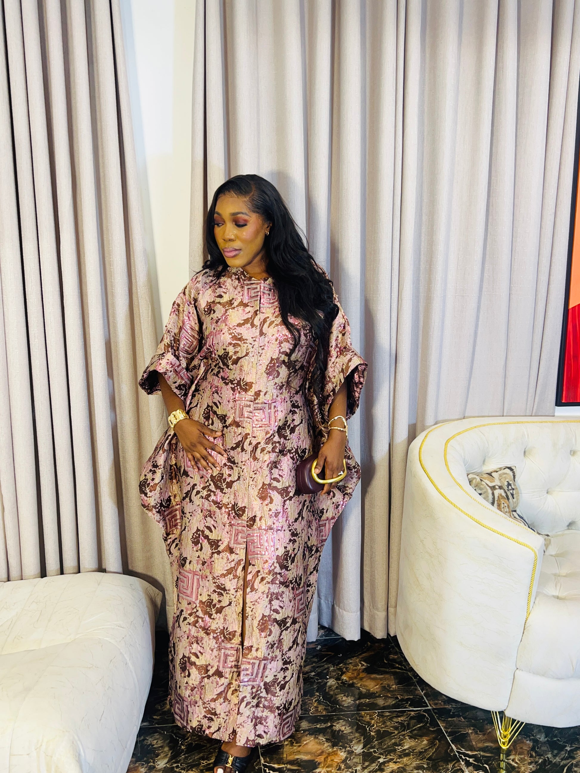 Woman wearing Ayinke Brocade Boubou – 62” length, oversized fit.