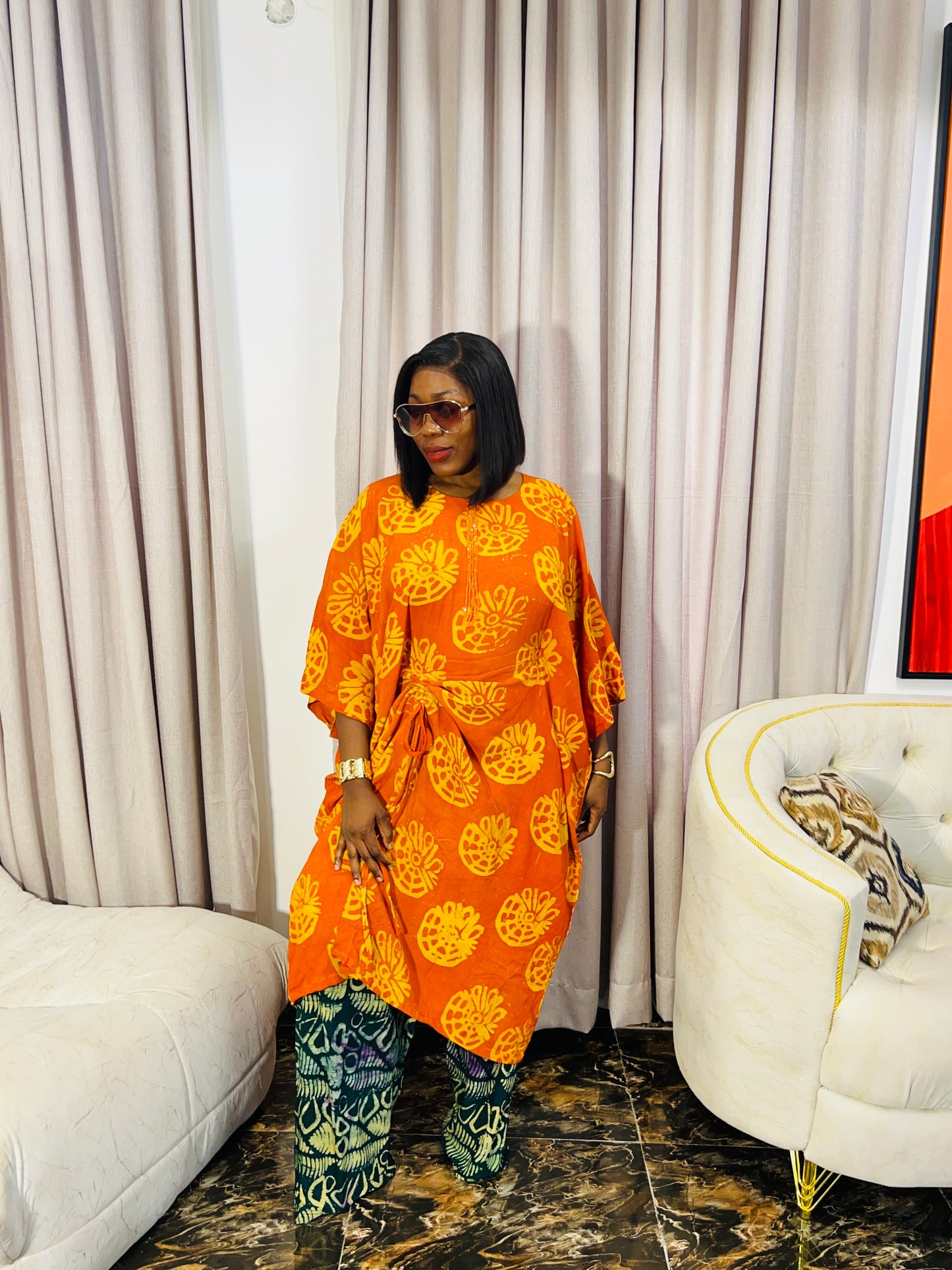 Model wearing Zahra Adire two-piece pant set 