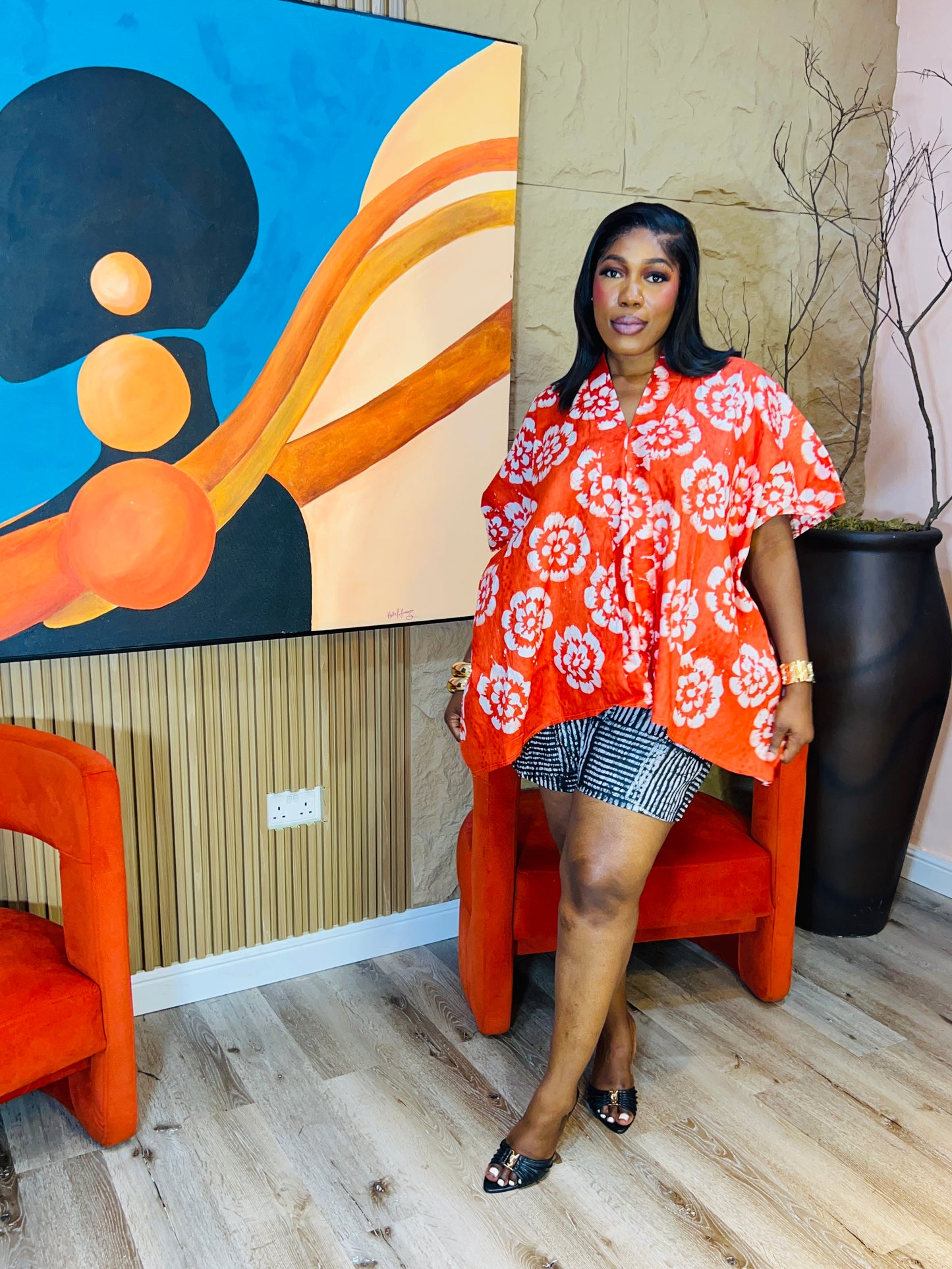 oversized Adire two-piece set with loose top and matching shorts, fits M–XL, tall girl friendly.