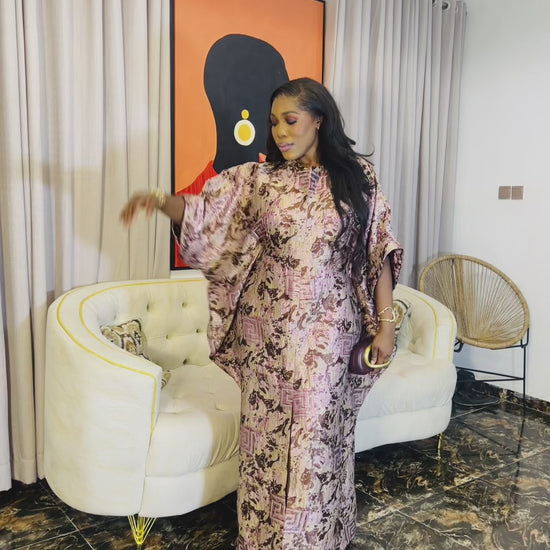 Woman wearing Ayinke Brocade Boubou – 62” length, oversized fit.