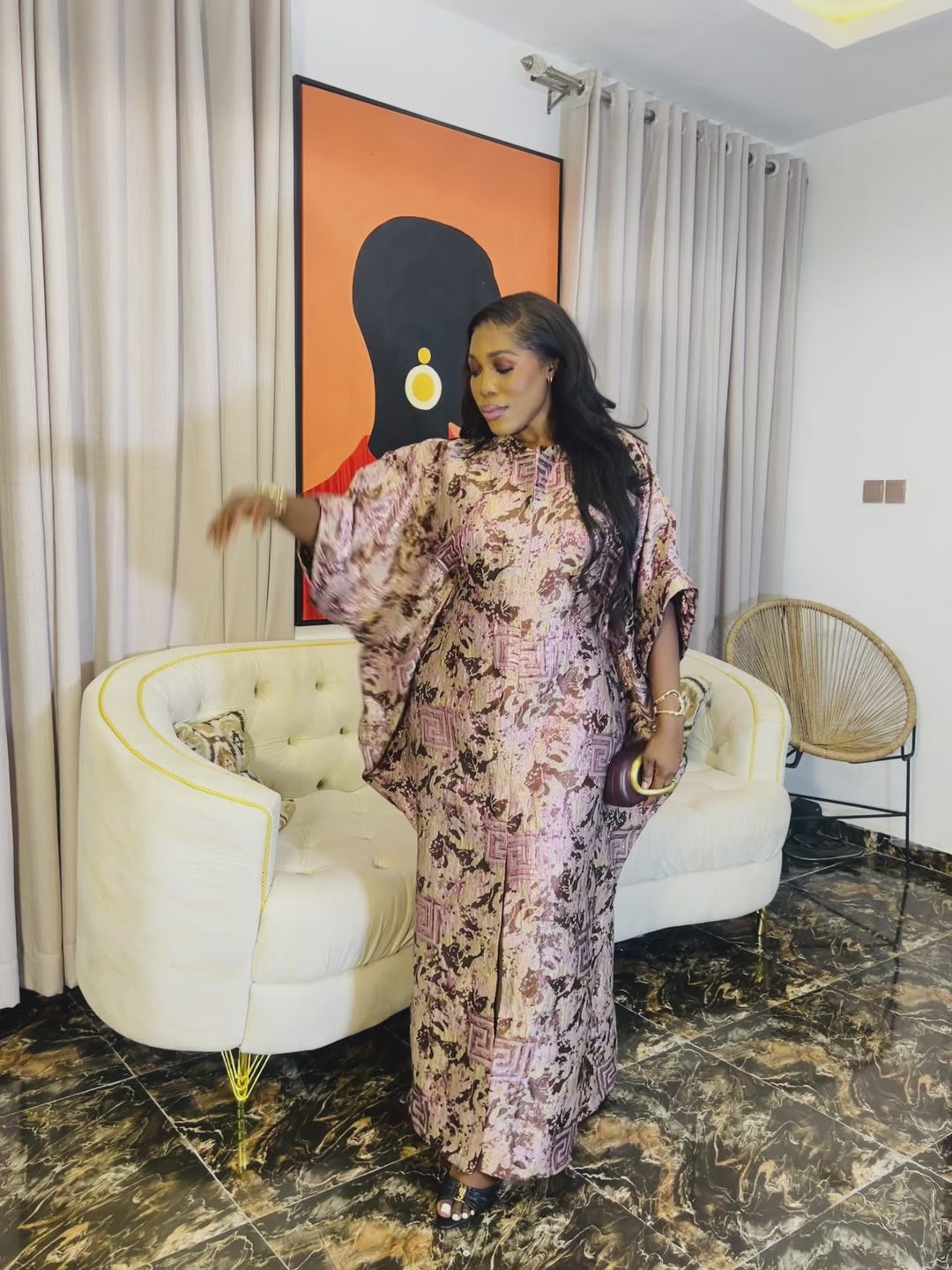 Woman wearing Ayinke Brocade Boubou – 62” length, oversized fit.