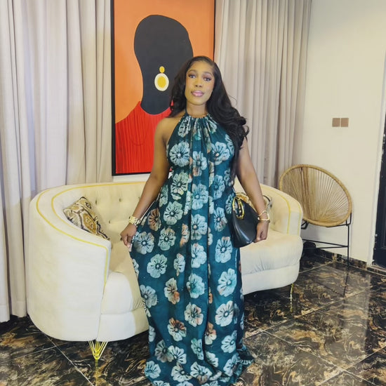 Woman wearing the Layla Adire Boubou in hand-dyed crepe fabric.