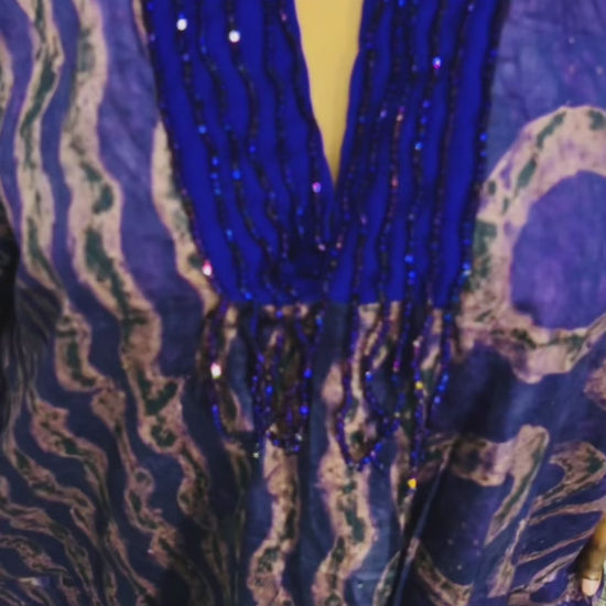 odel wearing Abike Adire beaded boubou dress 