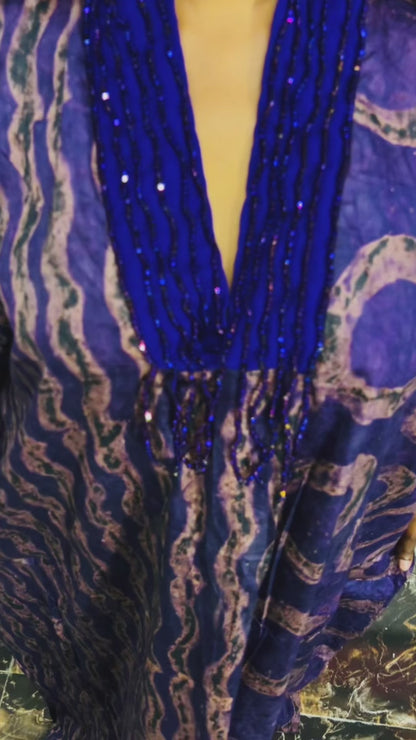 odel wearing Abike Adire beaded boubou dress 